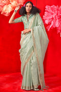 Foggy Green Zari Woven Pure Tissue Silk Saree