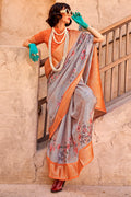Grey and Orange Zari Woven Printed Georgette saree